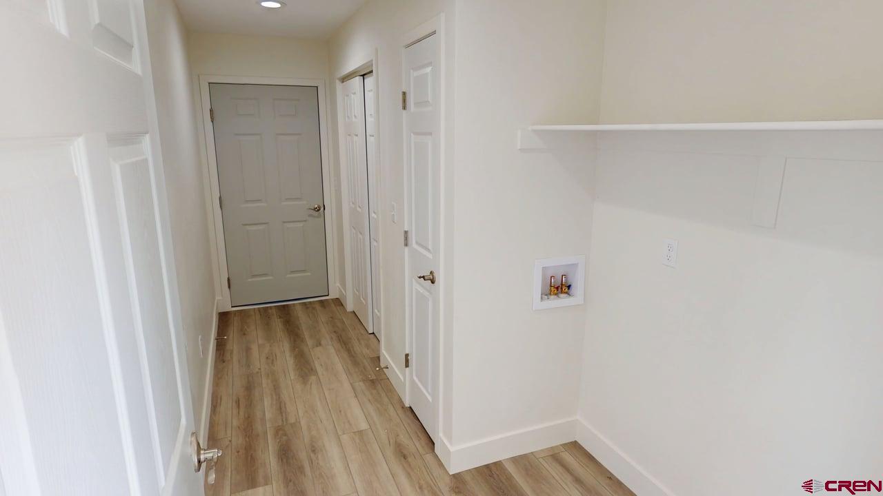 8714 Ridgetop Drive Alamosa, CO 81101 - Photo 17 of 18 a view of a hallway