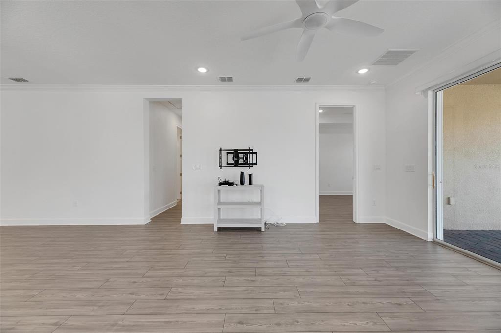 923 Signet Drive Apollo Beach, FL 33572 - Photo 30 of 84 a view of an empty room with wooden floor and closet