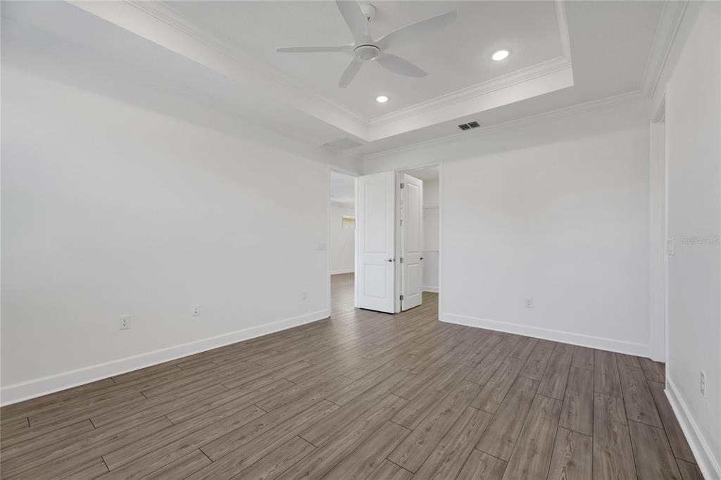 923 Signet Drive Apollo Beach, FL 33572 - Photo 33 of 84 a view of an empty room with wooden floor
