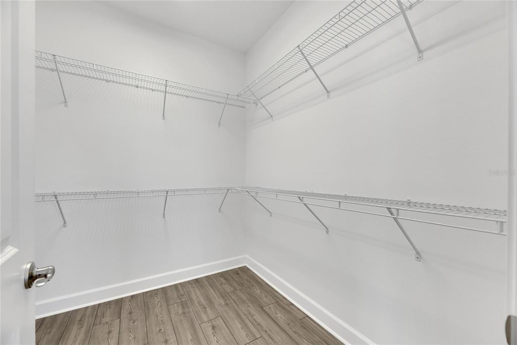 923 Signet Drive Apollo Beach, FL 33572 - Photo 35 of 84 a view of a room with racks on the wall