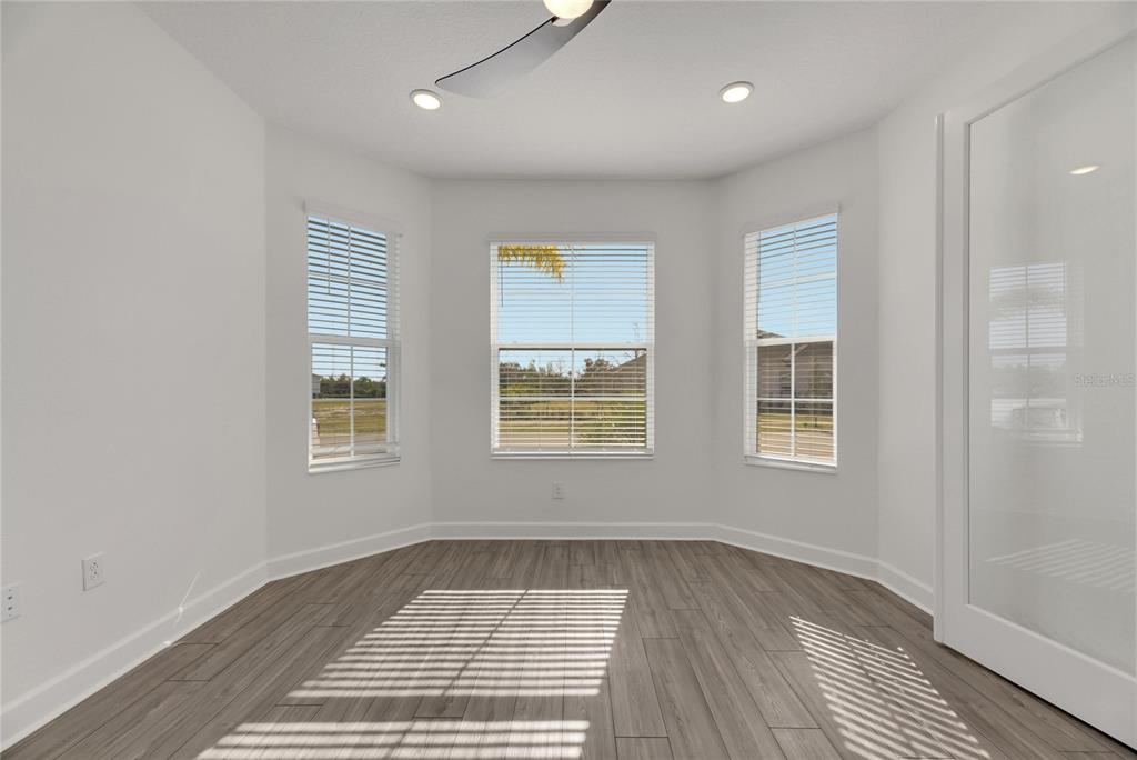 923 Signet Drive Apollo Beach, FL 33572 - Photo 9 of 84 a view of an empty room with a window