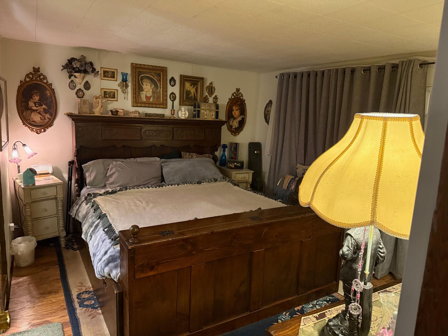 6538 Perry Road Magalia, CA 95954 - Photo 34 of 39 a bed sitting in a bedroom next to a window and a lamp