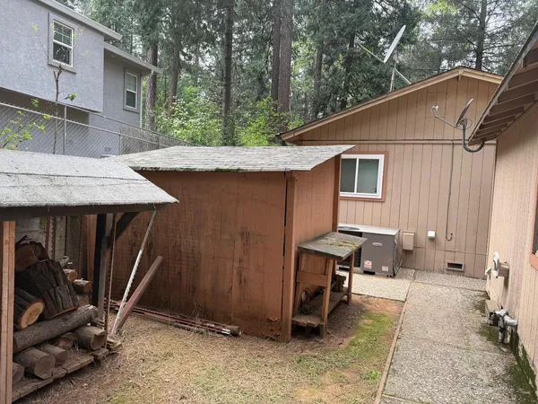 a patio with table and chairs