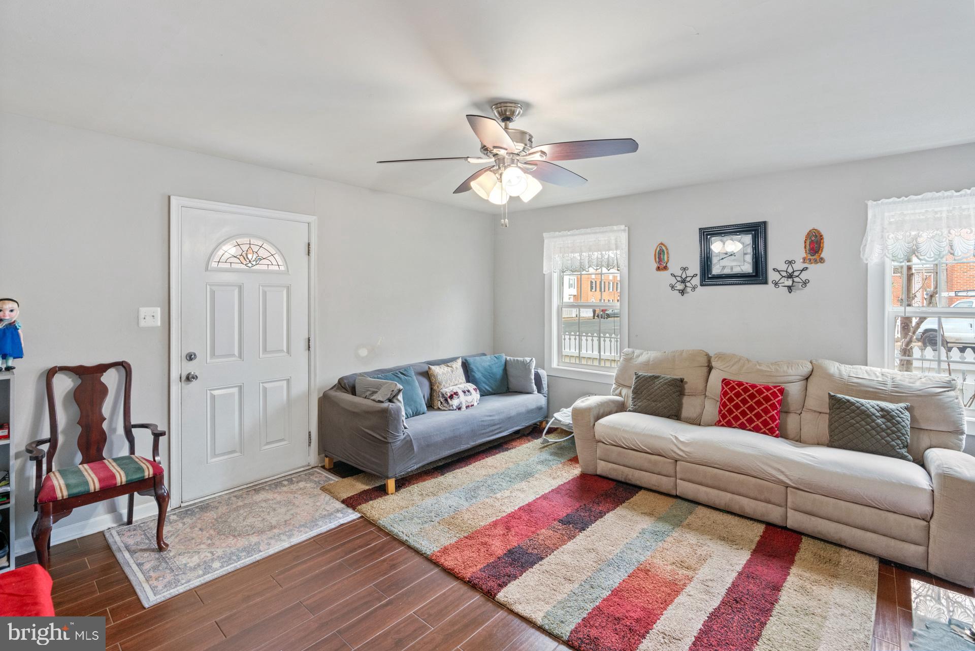 9315 Byrd Drive Manassas, VA 20110 - Photo 4 of 27 a living room with furniture and a rug