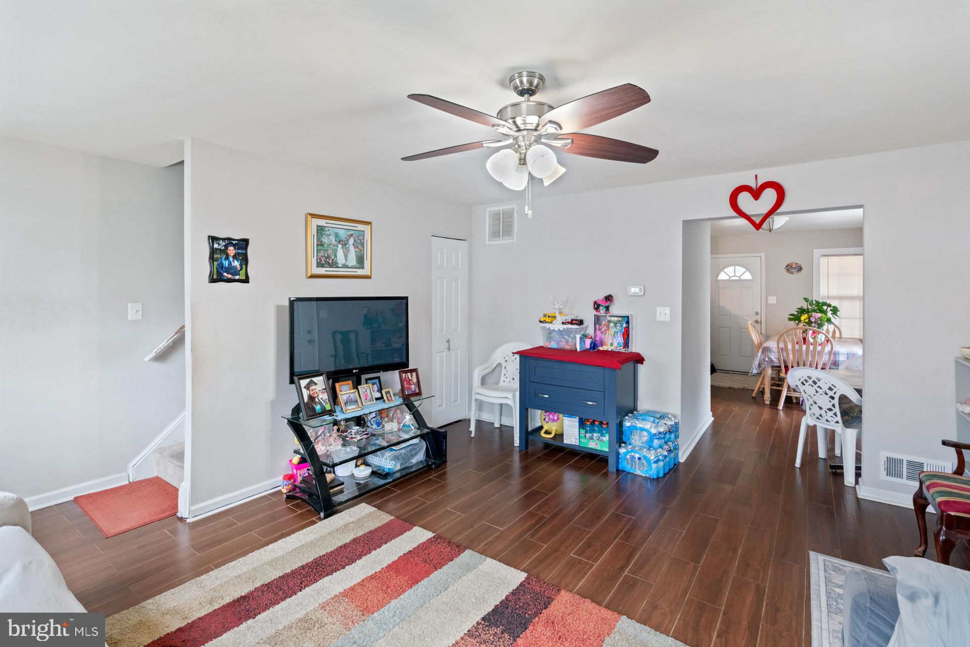 9315 Byrd Drive Manassas, VA 20110 - Photo 5 of 27 a living room with furniture and wooden floor