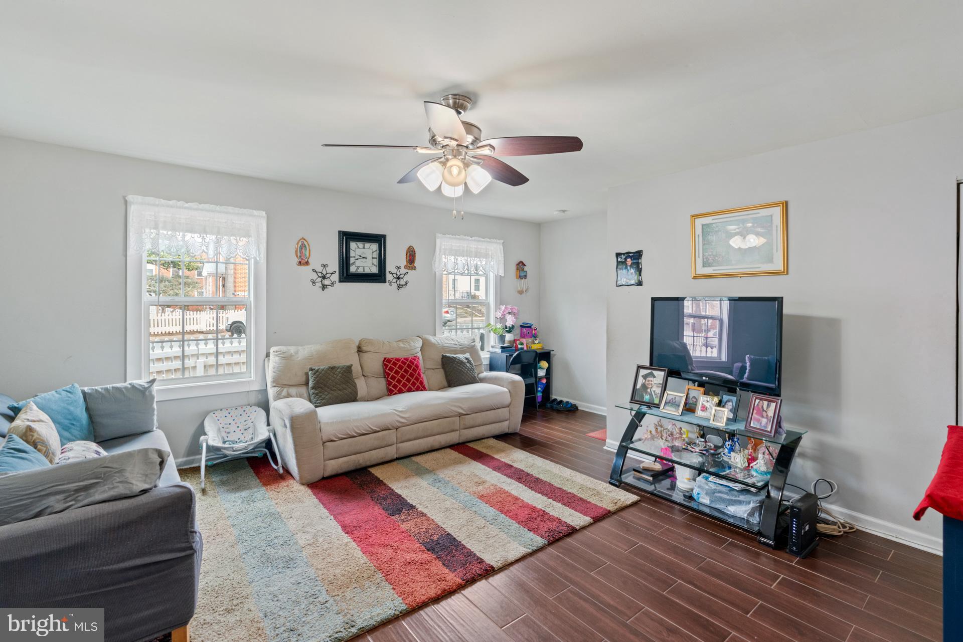 9315 Byrd Drive Manassas, VA 20110 - Photo 7 of 27 a living room with furniture and a wooden floor