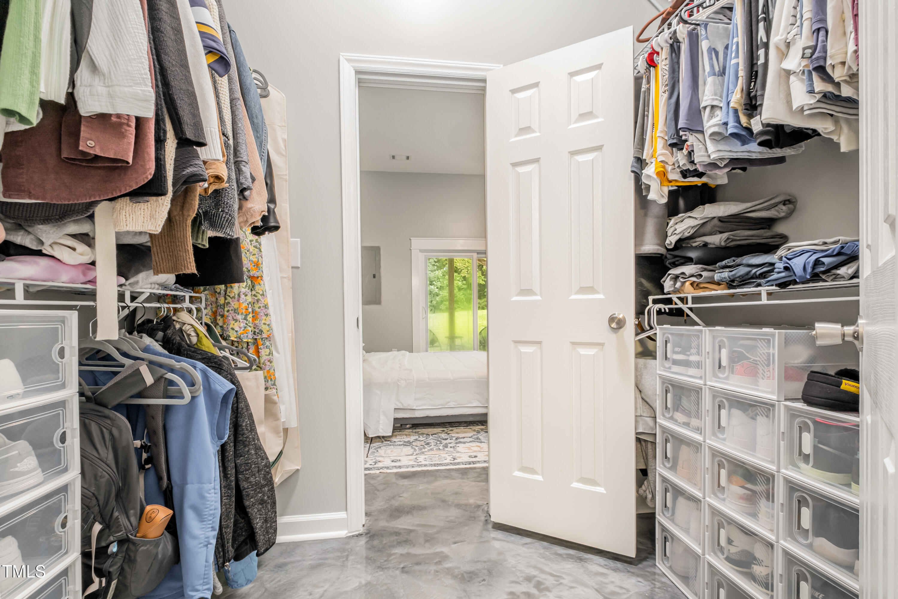 932 South 5th Street Mebane, NC 27302 - Photo 20 of 29 a view of walk in closet with clothes and shoes