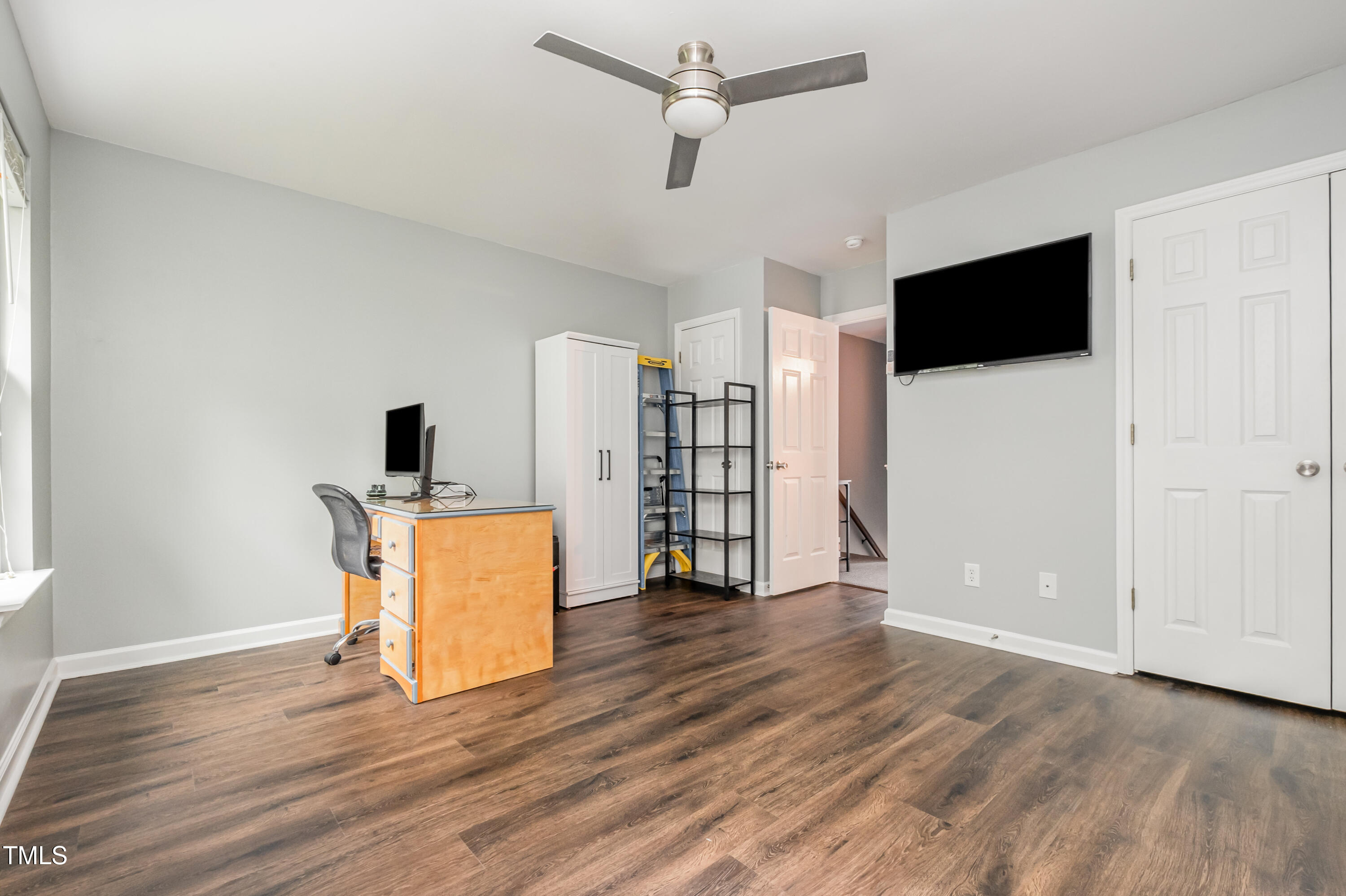 932 South 5th Street Mebane, NC 27302 - Photo 26 of 29 a view of an empty room with wooden floor and a window