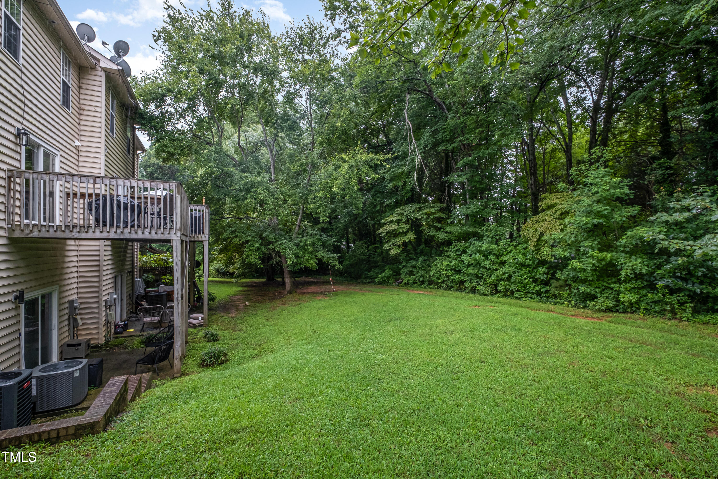 932 South 5th Street Mebane, NC 27302 - Photo 28 of 29 a view of a backyard with a deck