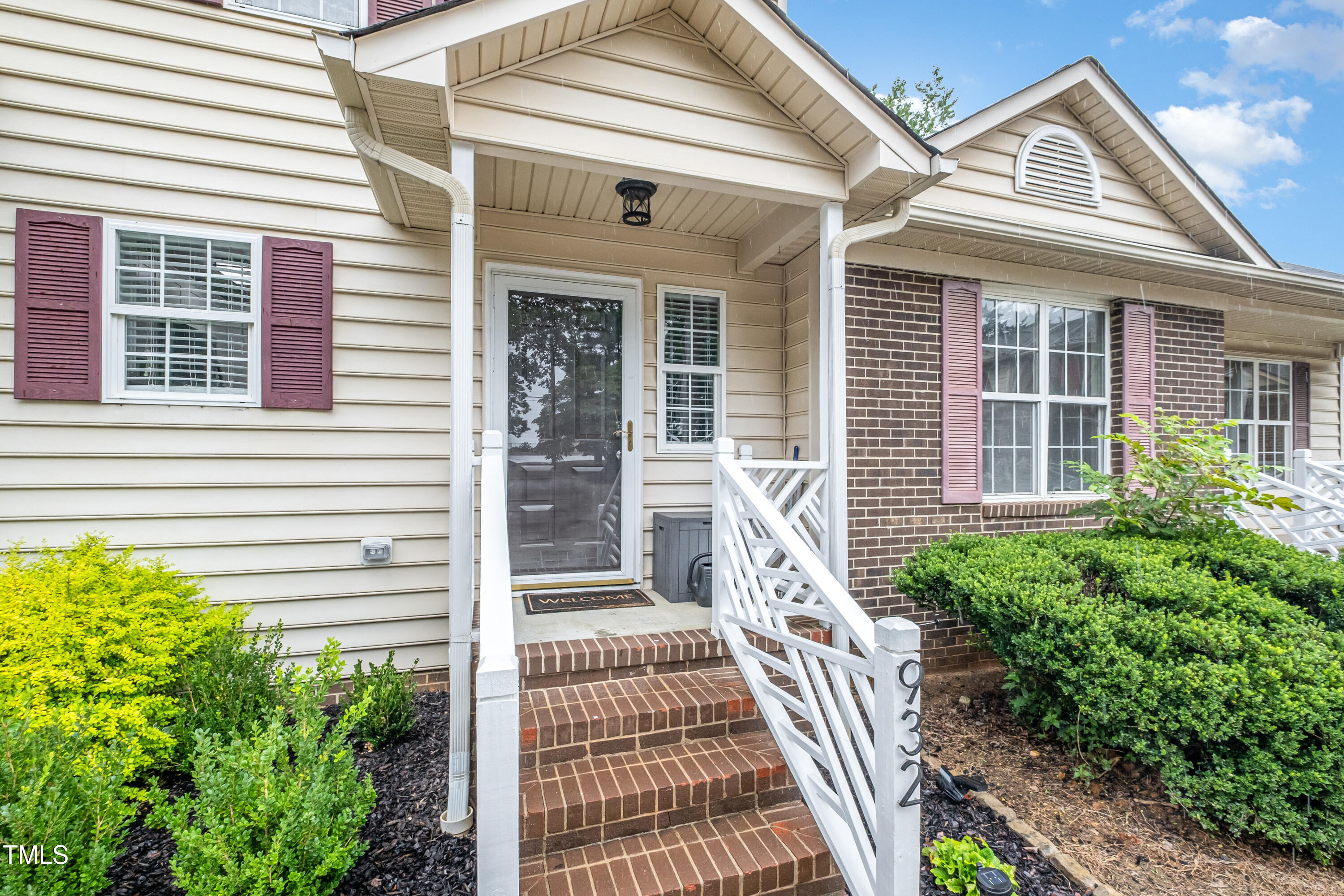 932 South 5th Street Mebane, NC 27302 - Photo 5 of 29 a front view of a house with a porch