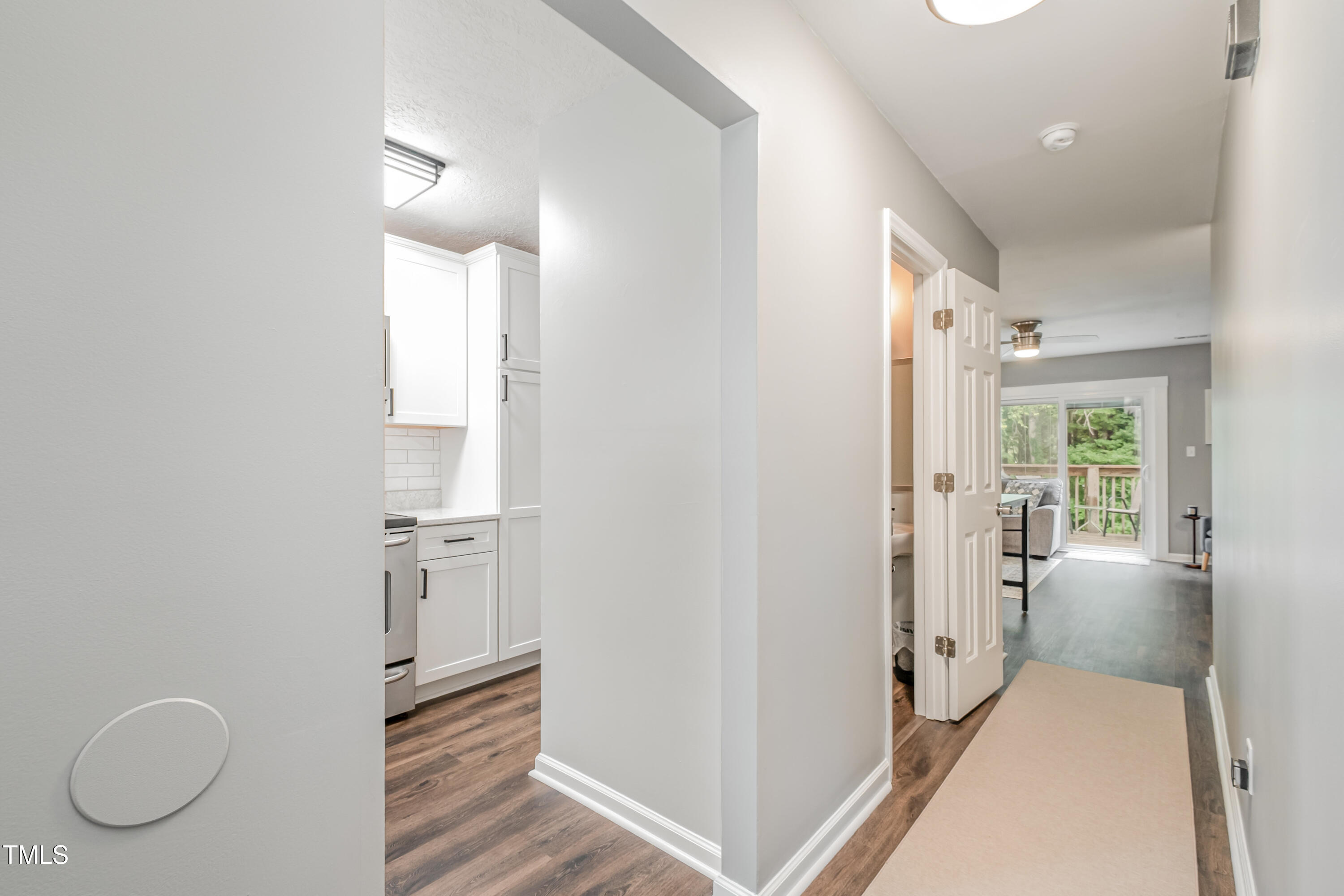 932 South 5th Street Mebane, NC 27302 - Photo 6 of 29 a view of a room with wooden floor and windows