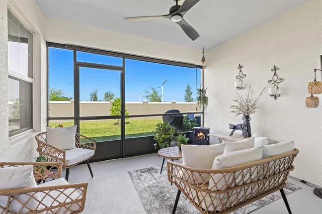 a living room with furniture and a window