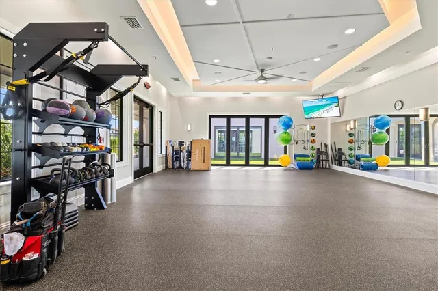 an aerial view of a house with yard swimming pool and outdoor seating