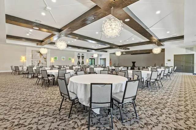 a view of a swimming pool with a yard