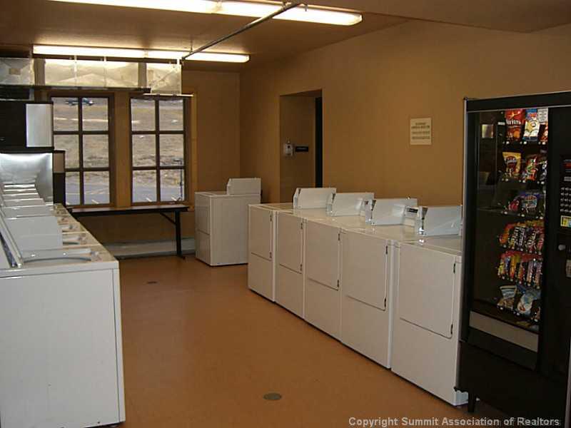 910 Copper Road, Unit 216 Copper Mountain, CO 80443 - Photo 16 of 18 a utility room with dryer and washer