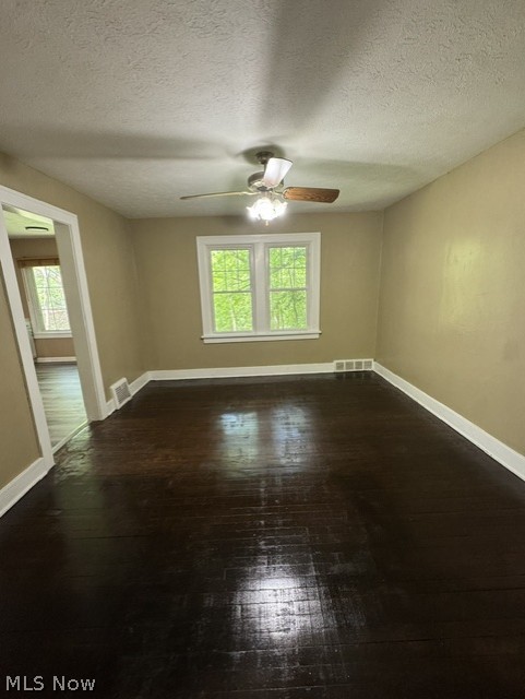 3917 Bluestone Road Cleveland, OH 44121 - Photo 3 of 13 Dining Room off Kitchen with beautiful Wood Floors and Wooded View