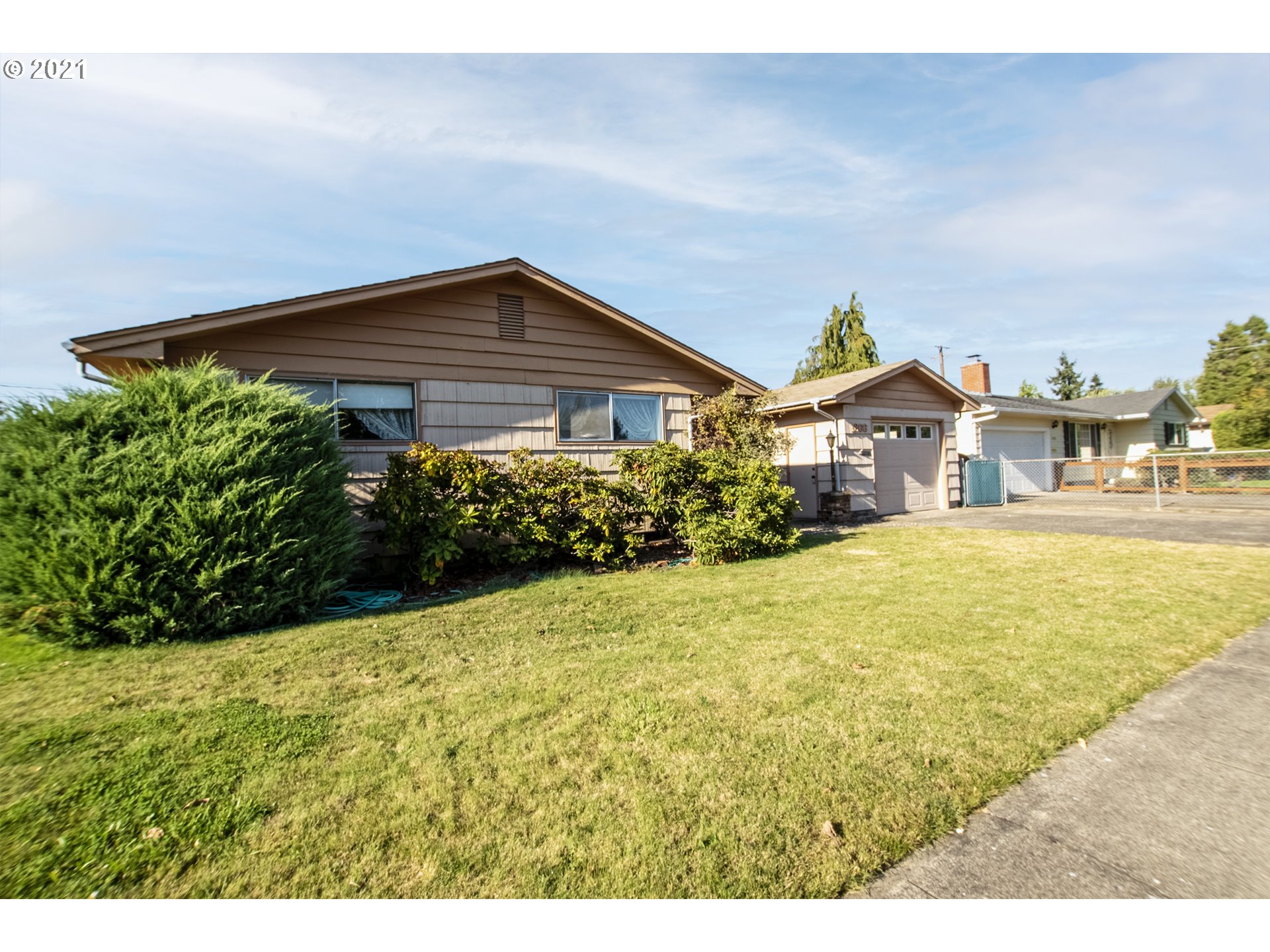 1366 N Street Springfield, OR 97477 - Photo 3 of 28 a house view with a outdoor space