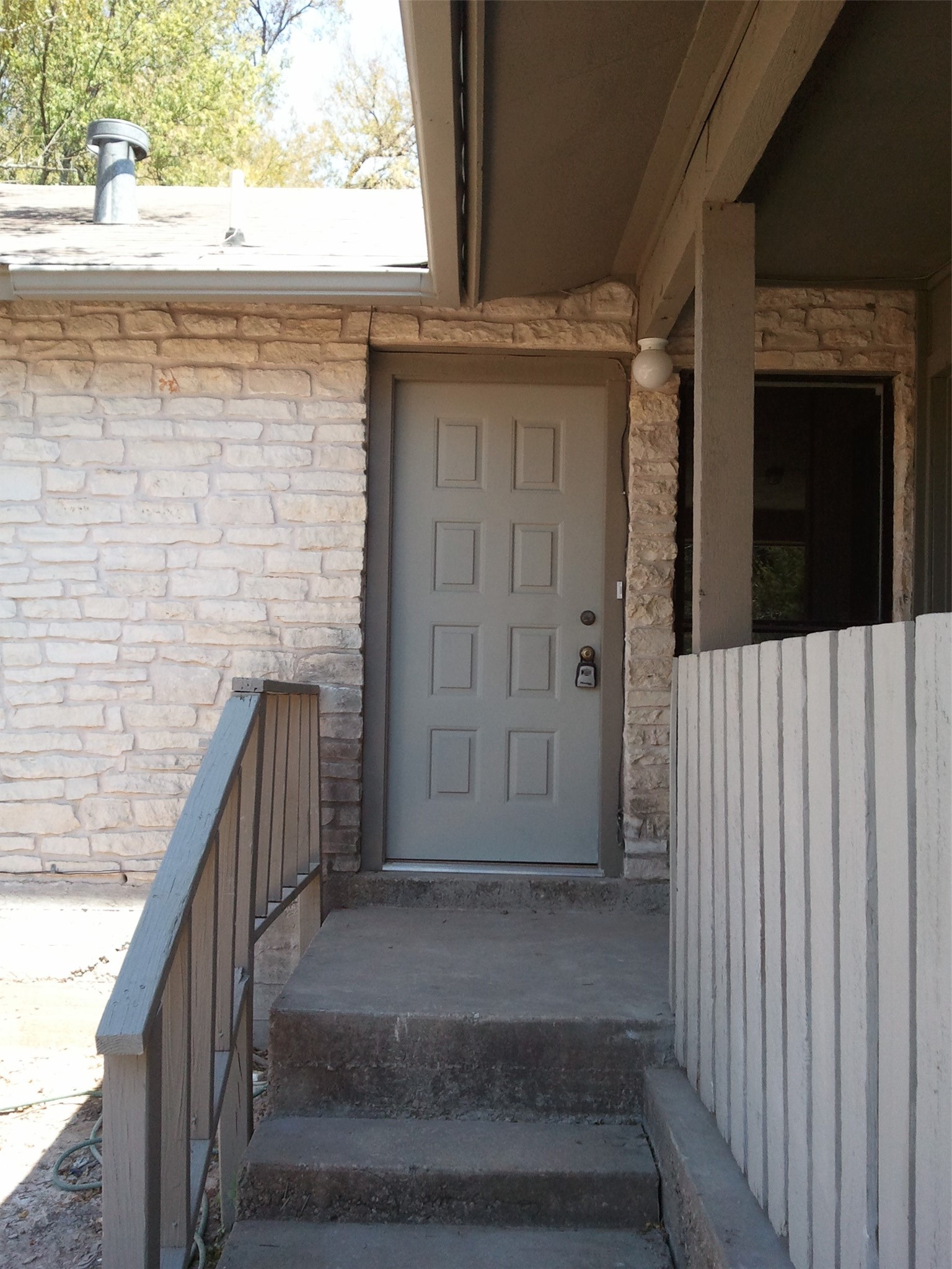 5212 Downs Drive Austin, TX 78721 - Photo 16 of 16 Front door Side A