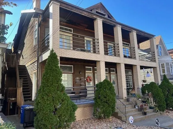 a house view with a garden space