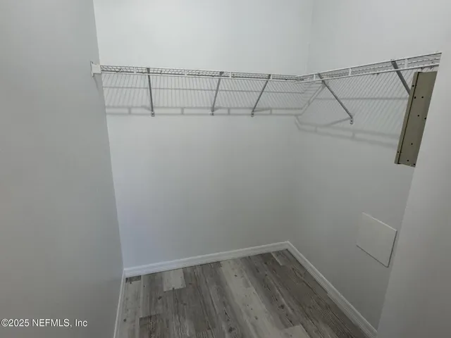 a view of a room with racks on the wall