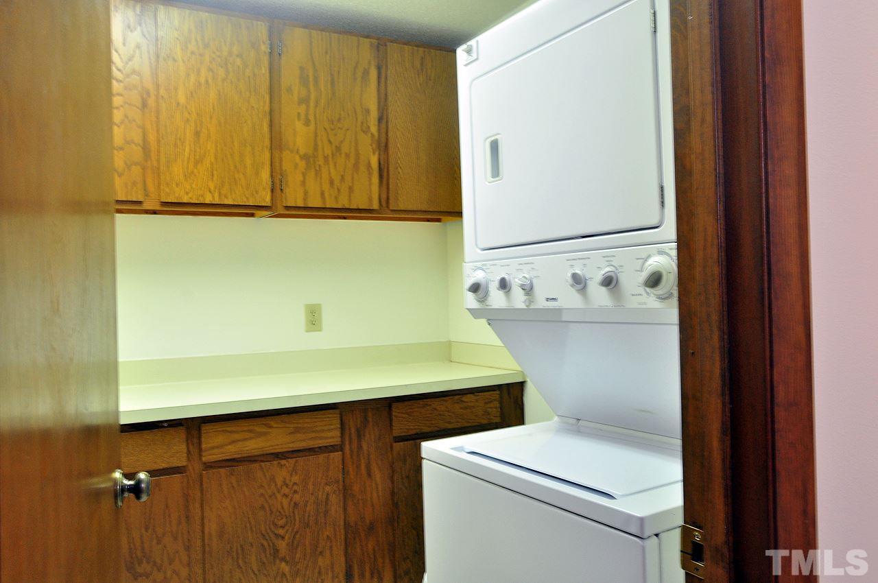 6 Pinnacle Road Durham, NC 27705 - Photo 16 of 24 a bathroom with a sink and a washer dryer