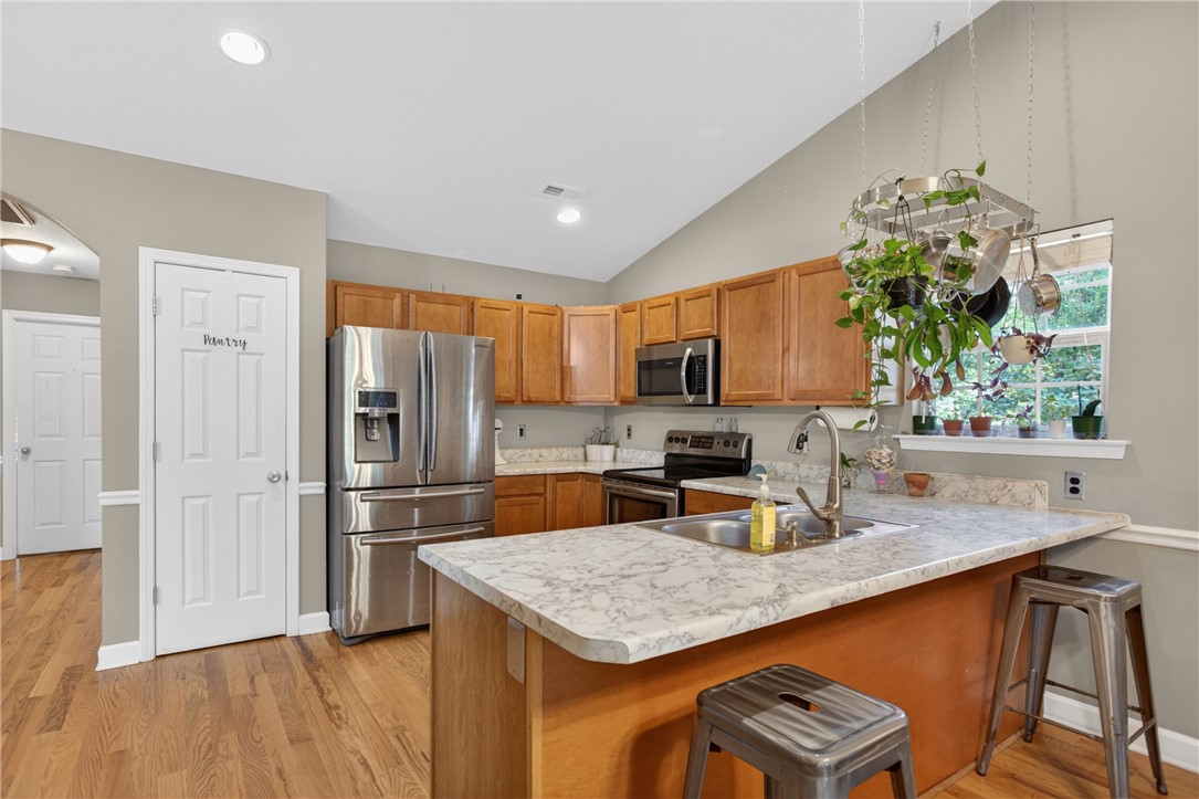 151 Towne Creek Trail Anderson, SC 29621 - Photo 7 of 49 Culinary creations come to life in this kitchen, complete with ample counter space and hardwood floors.