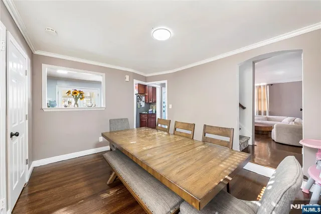 a room with furniture and wooden floor