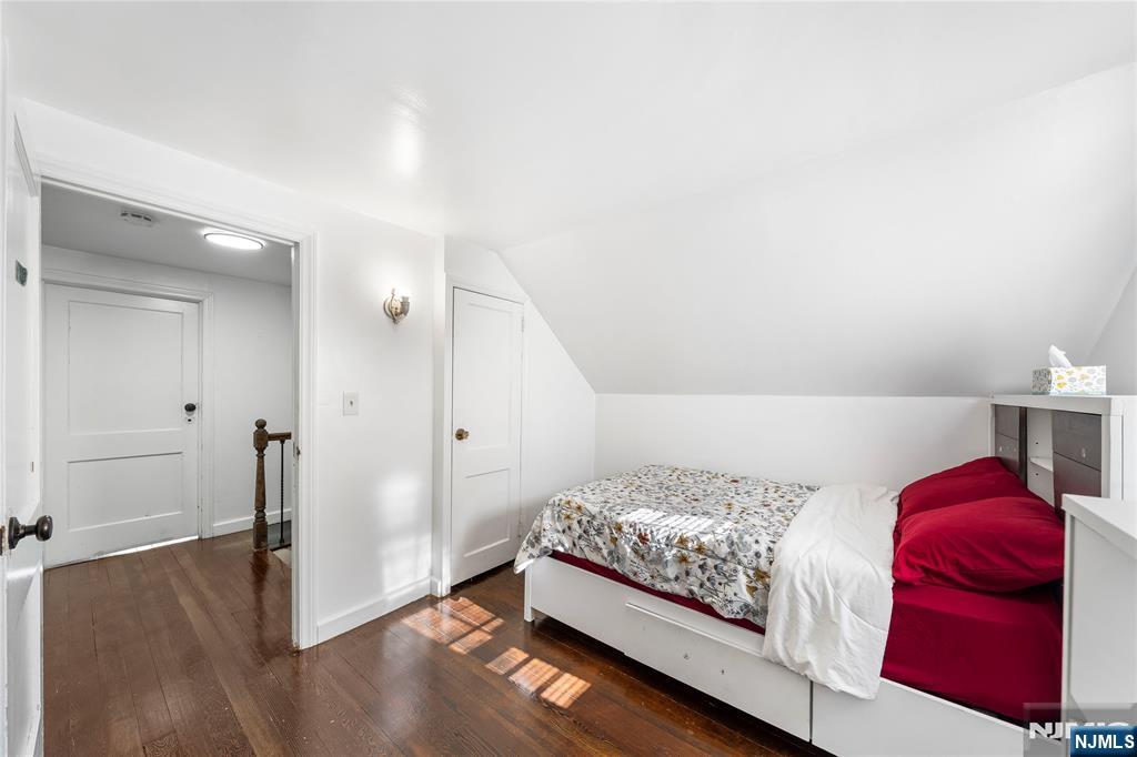 124 Hazley Avenue Rochelle Park, NJ 07662 - Photo 17 of 33 a bedroom with a bed and a couch