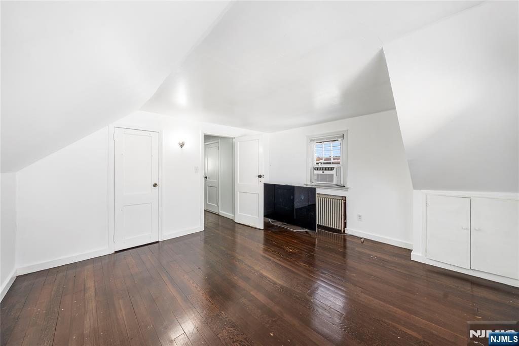 124 Hazley Avenue Rochelle Park, NJ 07662 - Photo 19 of 33 a view of empty room with wooden floor