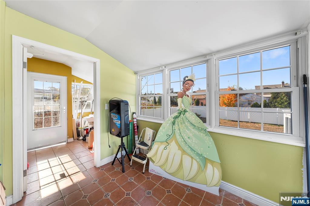 124 Hazley Avenue Rochelle Park, NJ 07662 - Photo 21 of 33 a living room with furniture and a large window