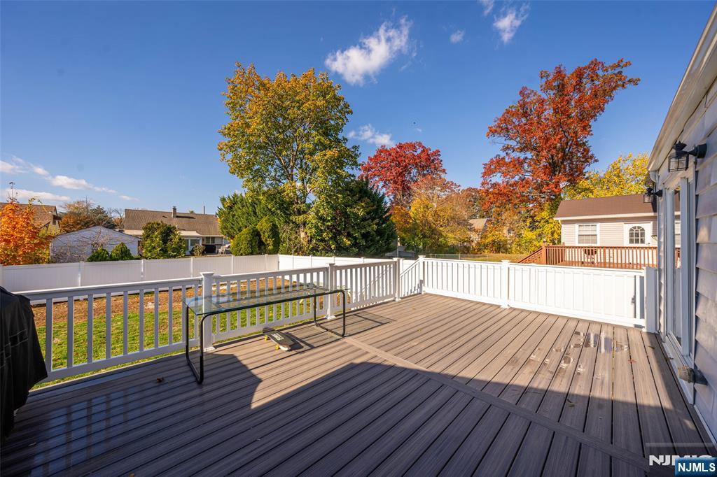 124 Hazley Avenue Rochelle Park, NJ 07662 - Photo 25 of 33 a view of balcony with wooden floor and outdoor space