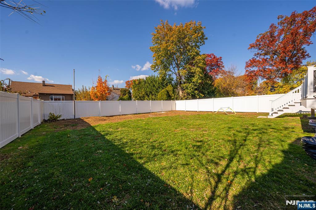 124 Hazley Avenue Rochelle Park, NJ 07662 - Photo 28 of 33 a view of an outdoor space and a yard