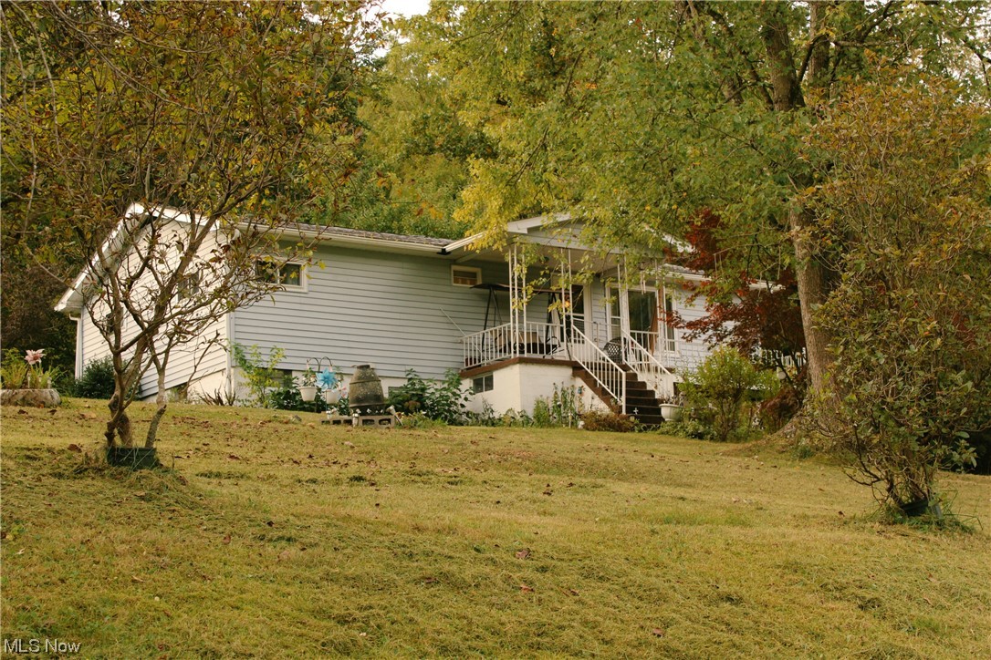 56824 Wegee Road Shadyside, OH 43947 - Photo 2 of 21 View of front facade with a front lawn and a porch