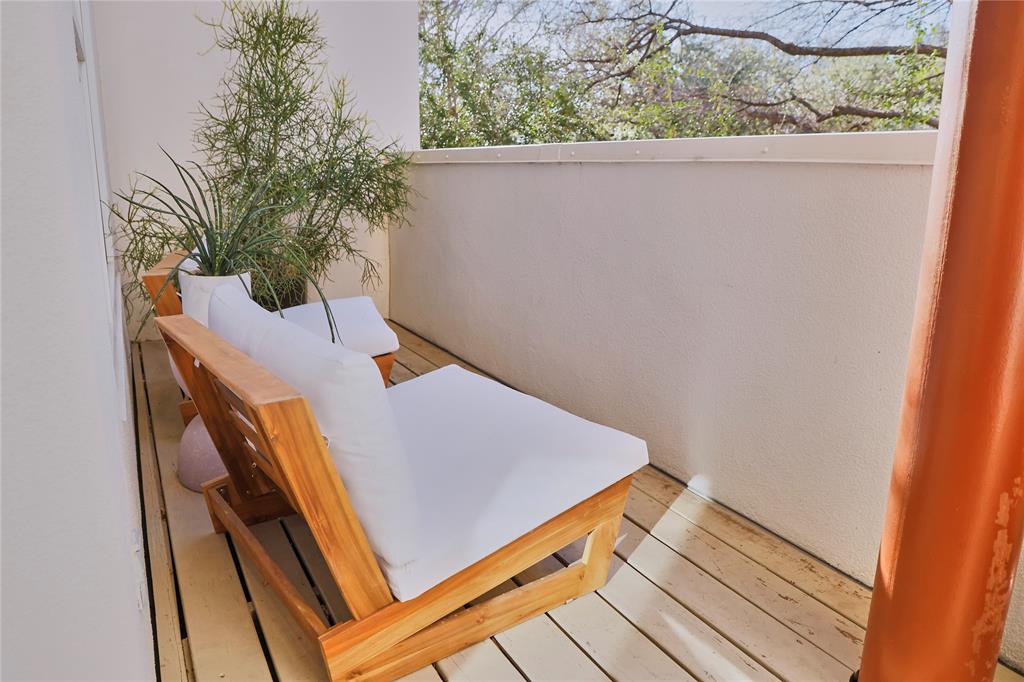 4026 Travis Street, Unit E Dallas, TX 75204 - Photo 11 of 19 a view of balcony with furniture