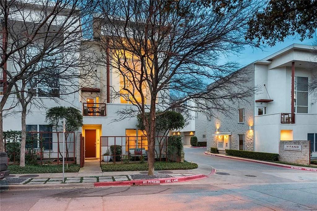 4026 Travis Street, Unit E Dallas, TX 75204 - Photo 2 of 19 a front view of a building with street view