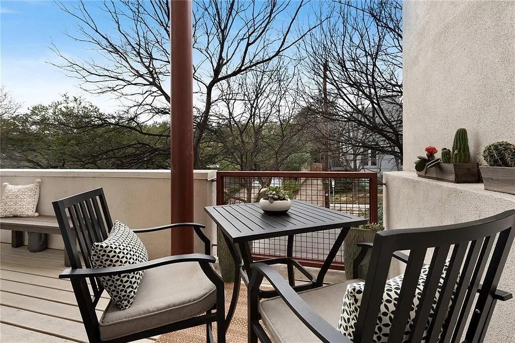 4026 Travis Street, Unit E Dallas, TX 75204 - Photo 6 of 19 a view of balcony and wooden floor