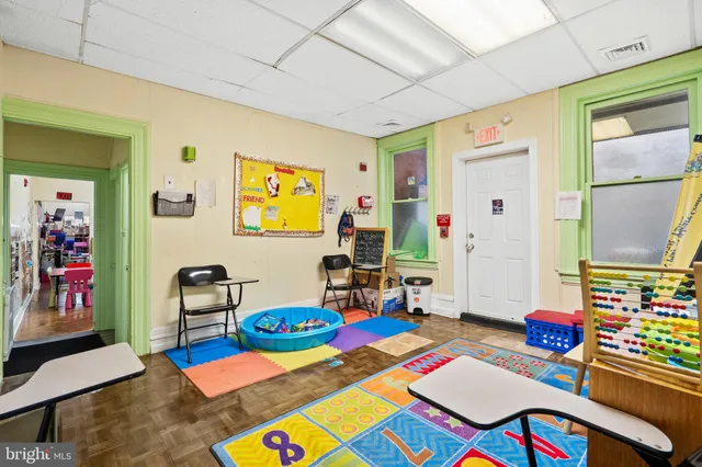 a living room filled with furniture and a table