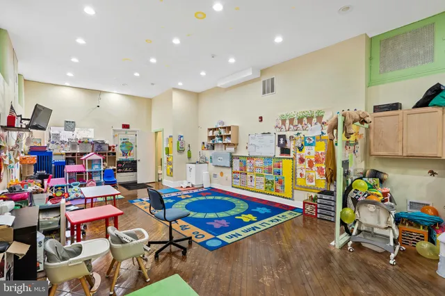 a room with lots of furniture and toys