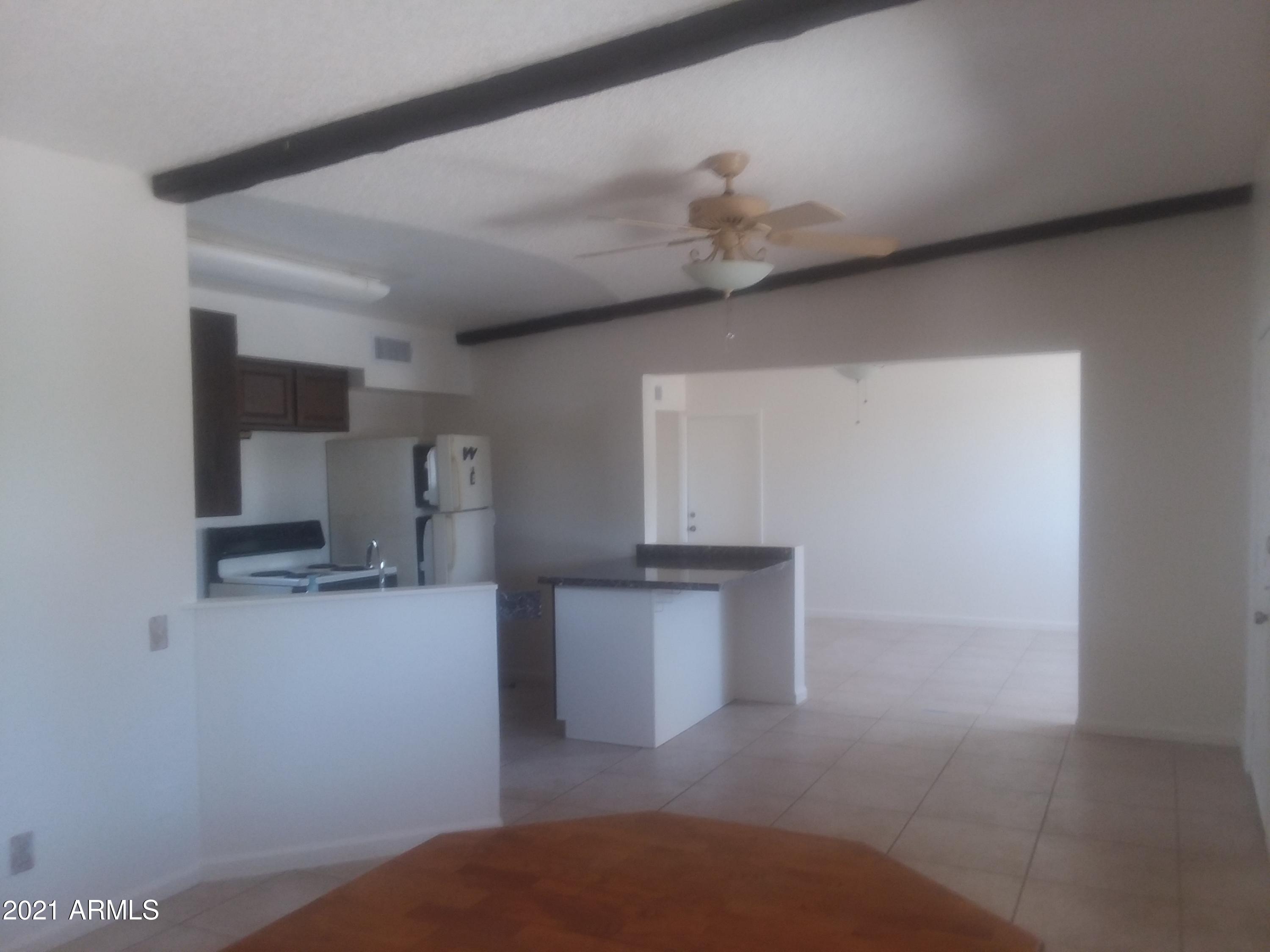 1244 North Boyd Road Apache Junction, AZ 85119 - Photo 15 of 36 Boyd dining toward kitchen
