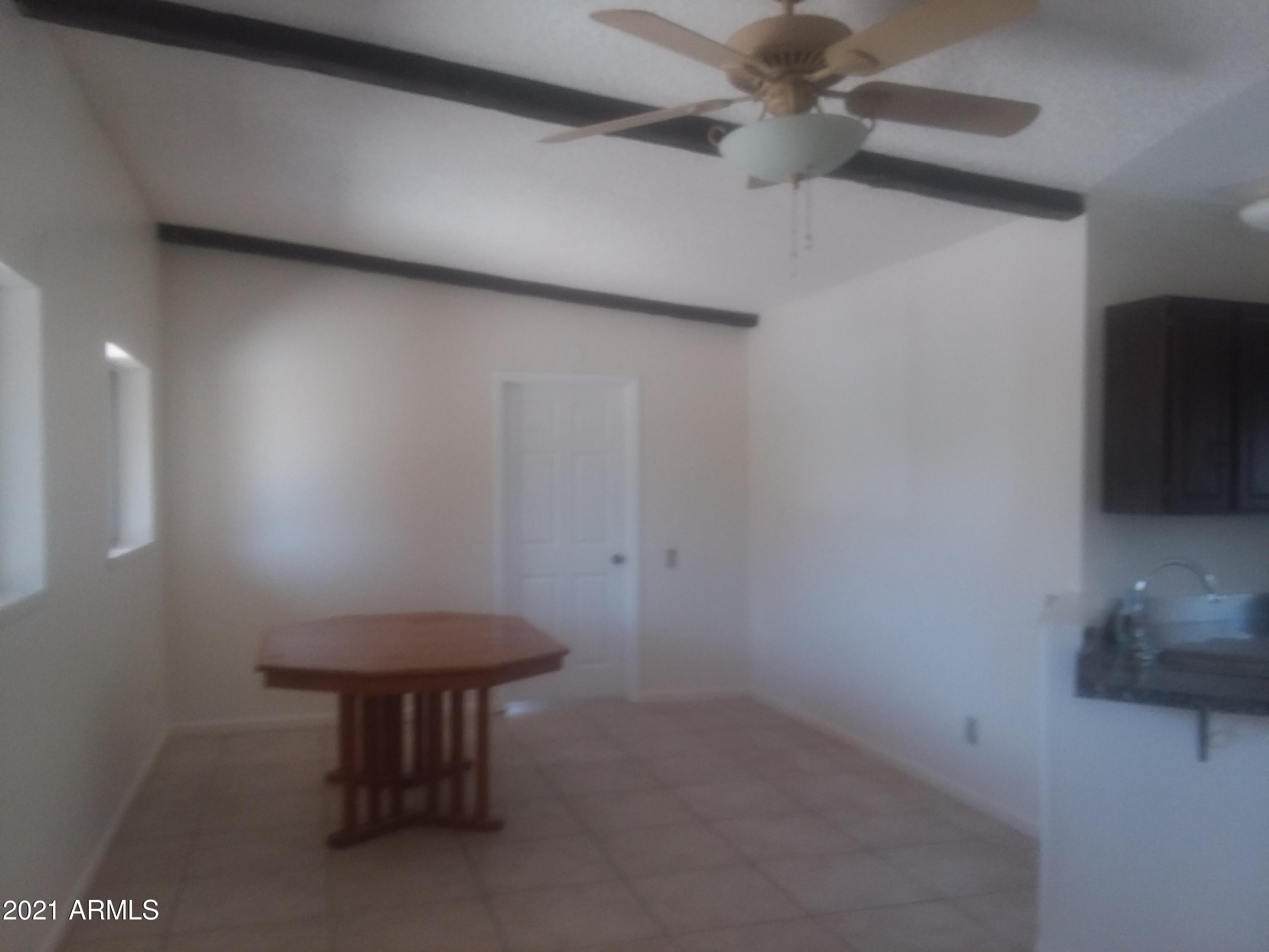 1244 North Boyd Road Apache Junction, AZ 85119 - Photo 16 of 36 Boyd dining toward bedroom