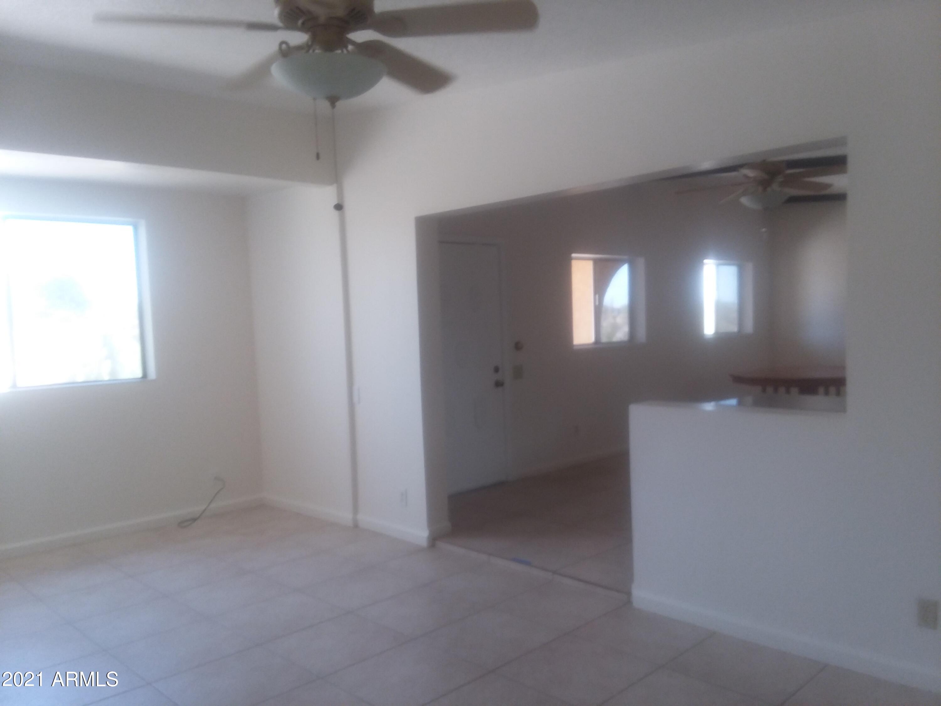 1244 North Boyd Road Apache Junction, AZ 85119 - Photo 18 of 36 Boyd livingroom toward front door