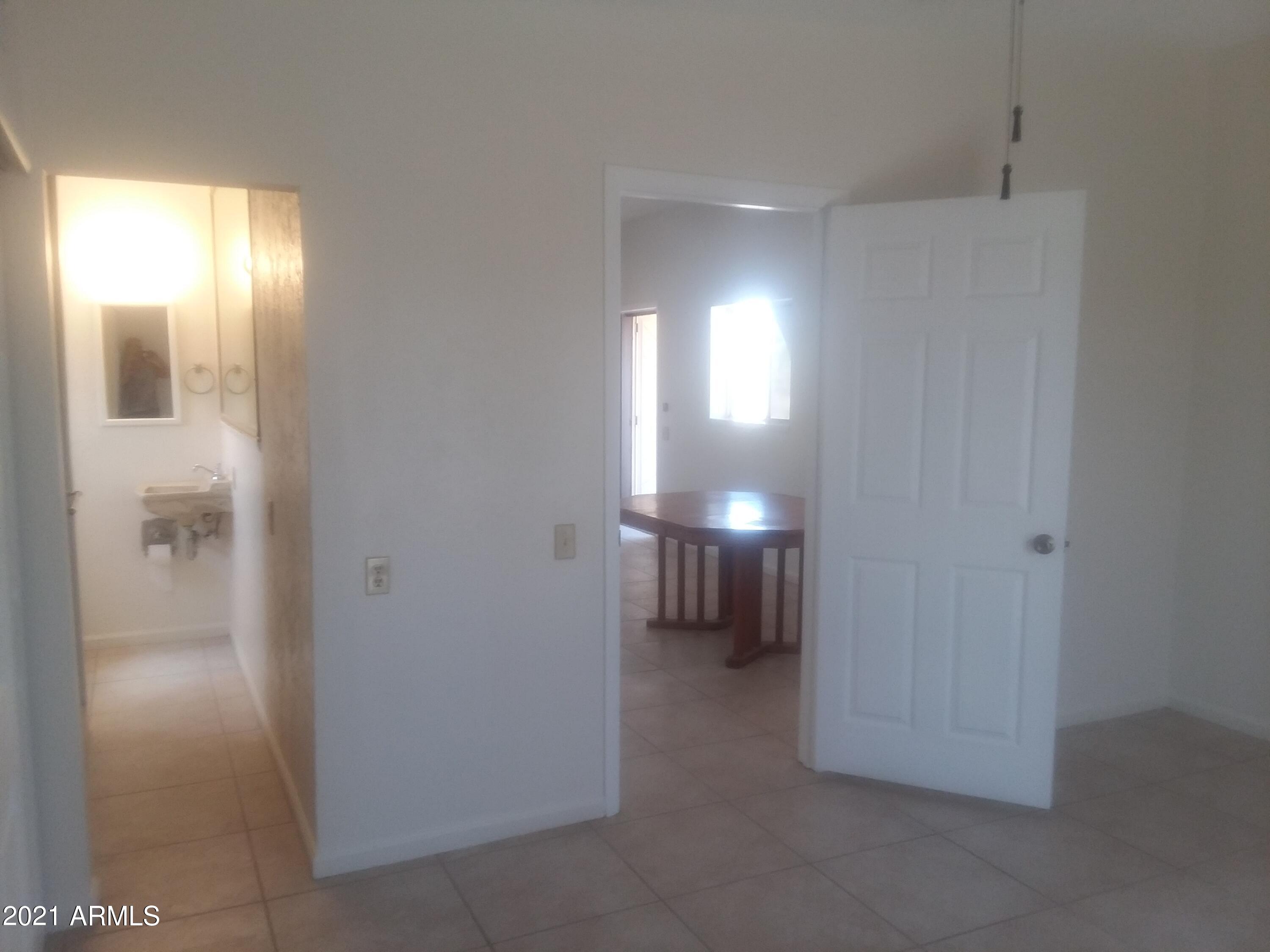 1244 North Boyd Road Apache Junction, AZ 85119 - Photo 24 of 36 Boyd bedroom toward bath and dining