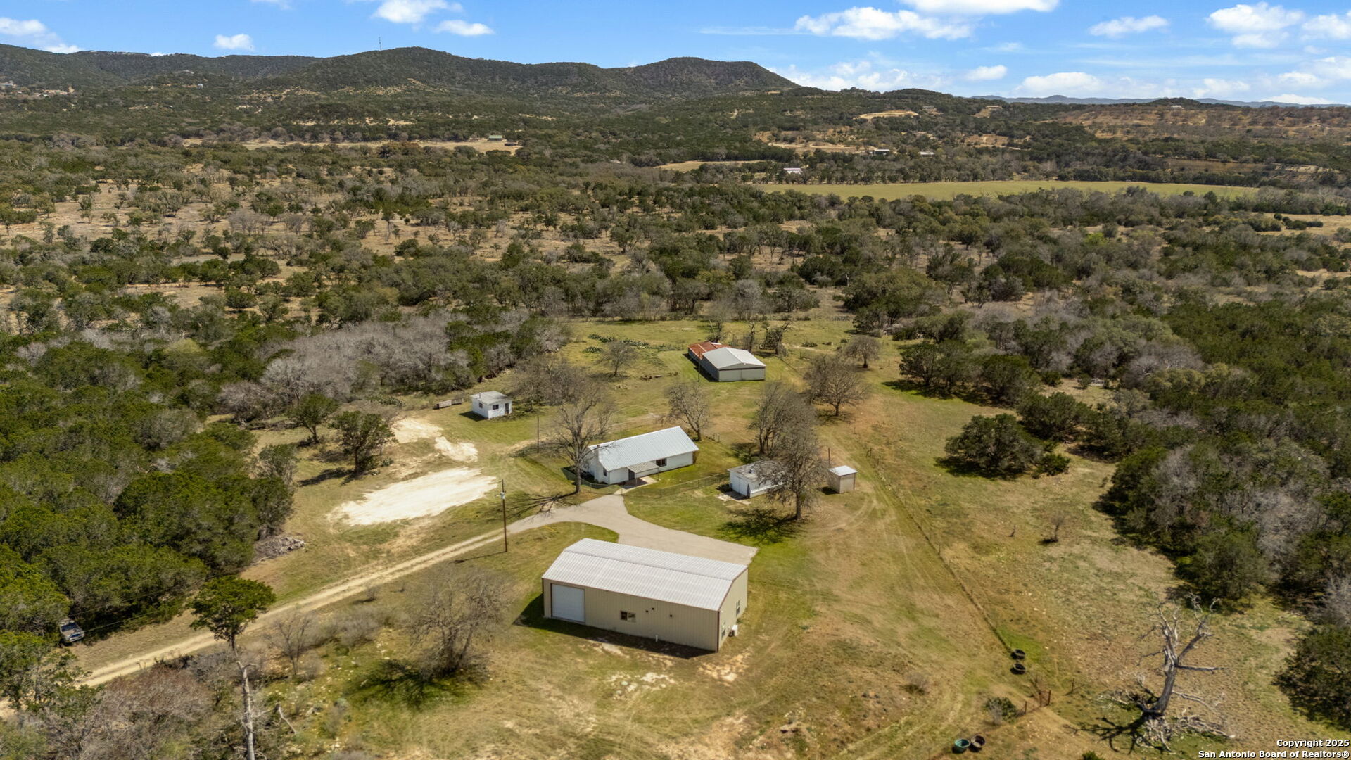 3584 Privilege Creek Road Pipe Creek, TX 78063 - Photo 1 of 66 a view of city and mountain