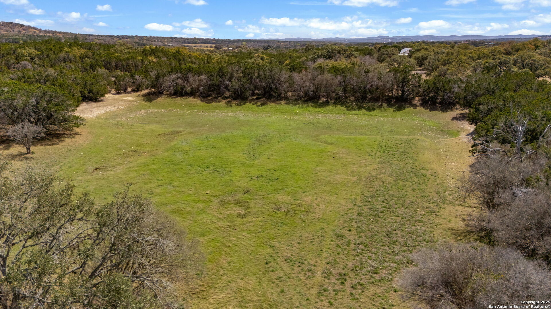 3584 Privilege Creek Road Pipe Creek, TX 78063 - Photo 13 of 66 a view of an ocean from a yard