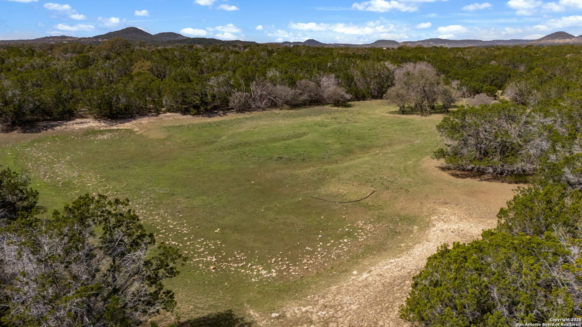 3584 Privilege Creek Road Pipe Creek, TX 78063 - Photo 14 of 66 a view of an outdoor space and mountain view
