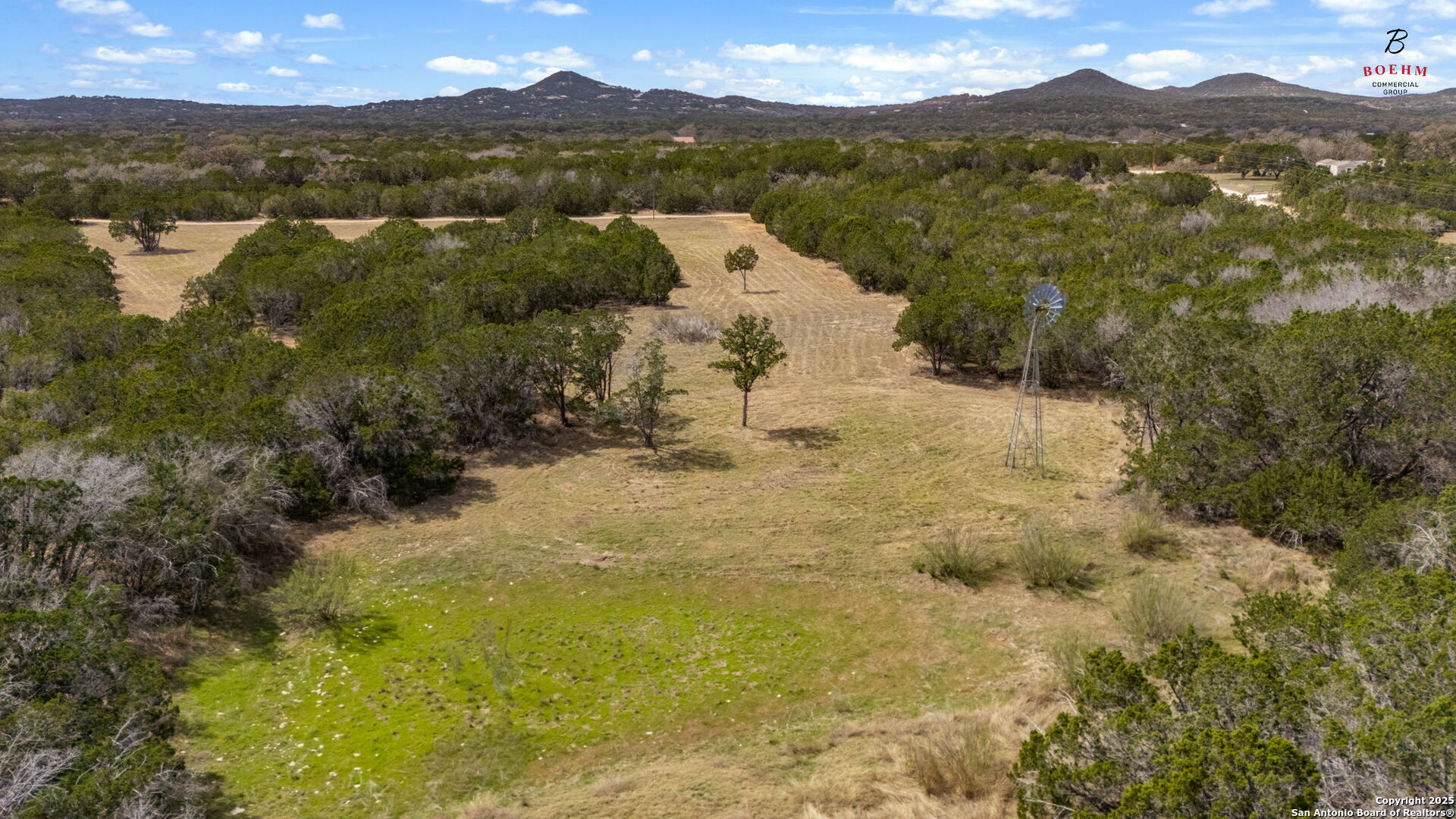 3584 Privilege Creek Road Pipe Creek, TX 78063 - Photo 23 of 66 a view of lake with mountain