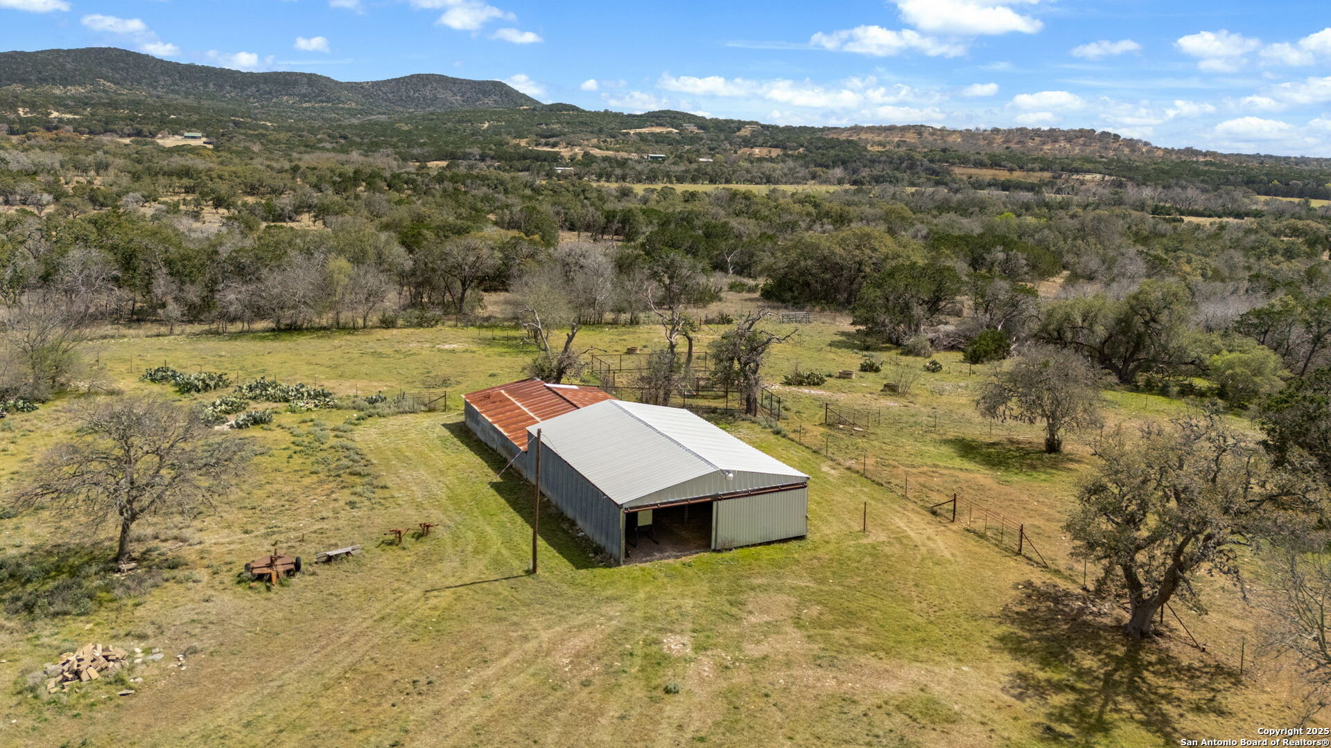 3584 Privilege Creek Road Pipe Creek, TX 78063 - Photo 32 of 66 a view of a lake with a mountain