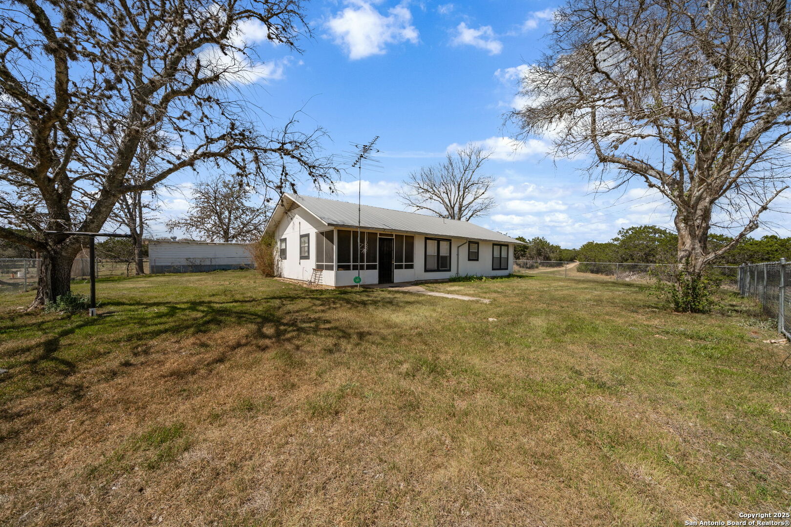 3584 Privilege Creek Road Pipe Creek, TX 78063 - Photo 44 of 66 a front view of house with yard and green space