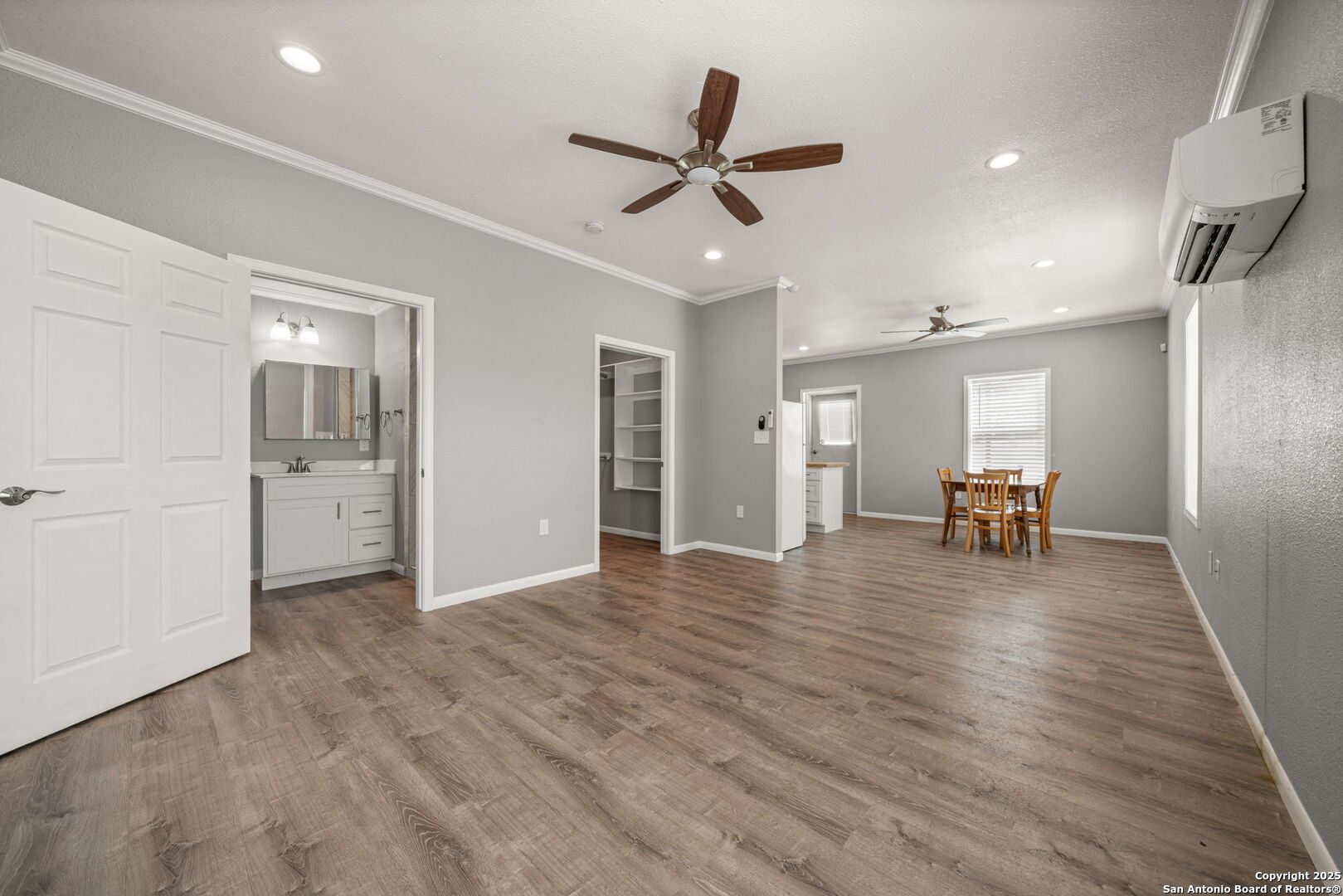 3584 Privilege Creek Road Pipe Creek, TX 78063 - Photo 53 of 66 a view of empty room with wooden floor and a ceiling fan