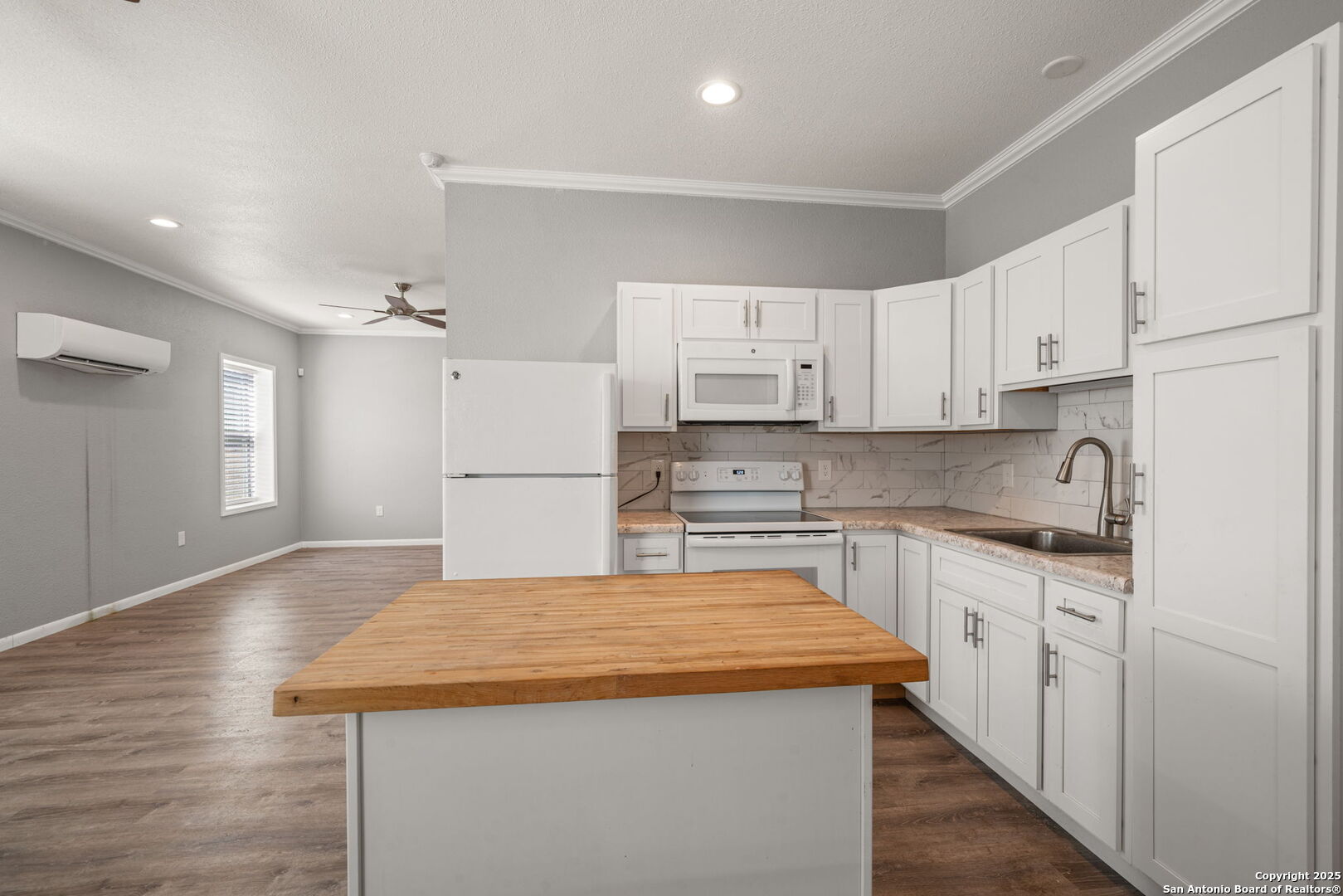 3584 Privilege Creek Road Pipe Creek, TX 78063 - Photo 56 of 66 a kitchen with stainless steel appliances granite countertop a sink stove and refrigerator